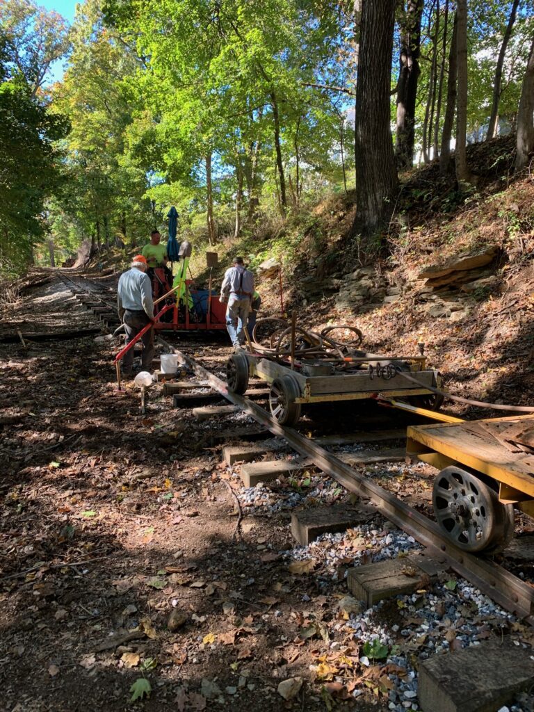 Volunteers replacing ties along the line